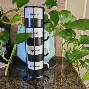 Set of four stackable ceramic espresso cups held in a black metal tower rack-NEW